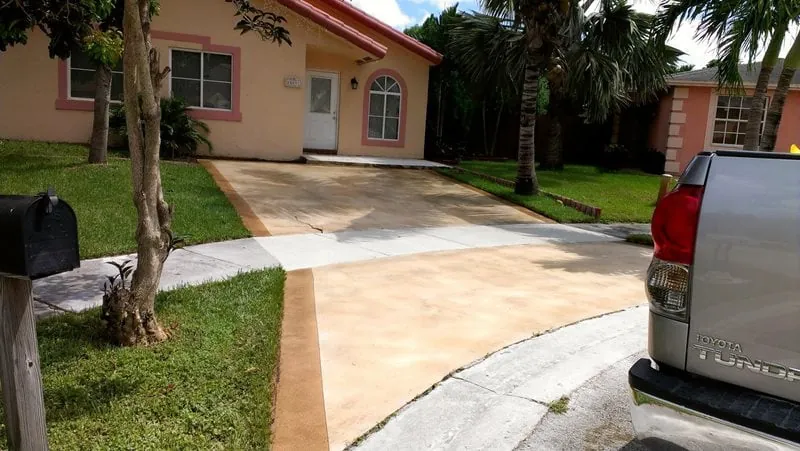 Cream stained concrete driveway
