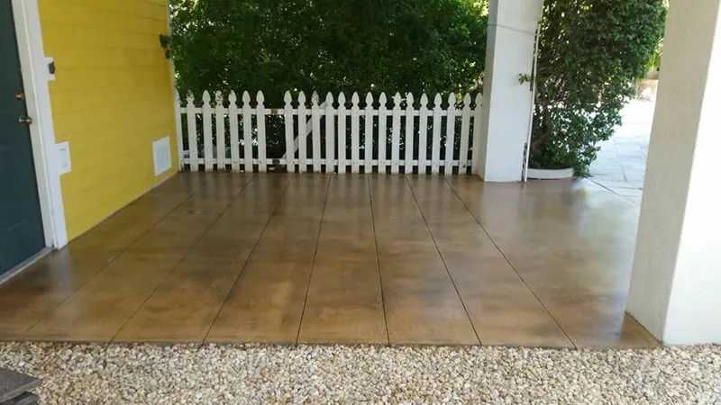 Wood-plank stained concrete porch